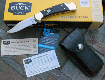 Buck 110 AUTO Folding Hunter 3.75 Plain Blade, Ebony Wood Handles, Leather  Sheath - KnifeCenter - 11197