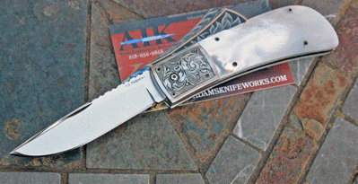 AA Sanders Hidden Release D/A Auto w/Engraved Bolsters & Pearl