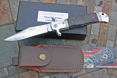 CZ Czech Republic Hidden Release Liner Lock Auto with Ebony Wood